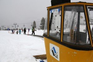 old school Vail gondola at top of magic carpet