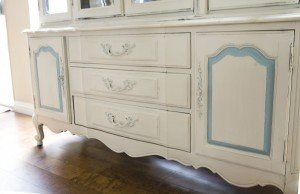 bottom half of antique hutch painted in Annie Sloan Old Ochre and duck egg
