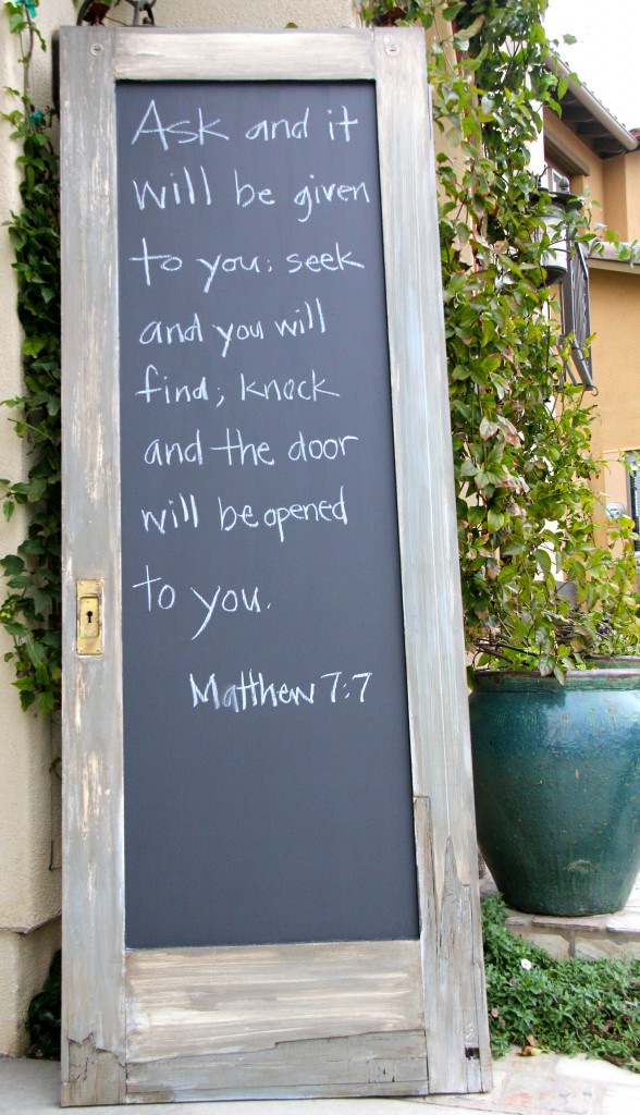 Matthew 7:7 verse on vintage door's chalk board panel