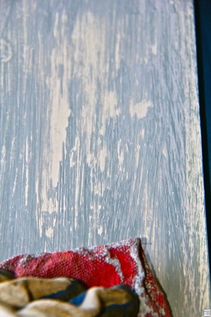 close-up of layered paint on vintage door refinishing