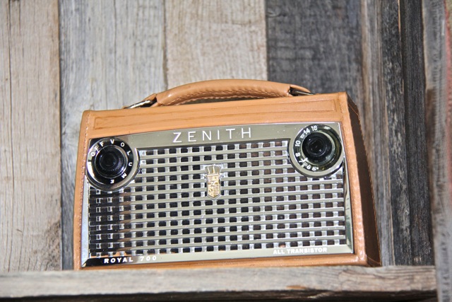 vintage Zenith radio displayed in rustic barn wood baker's rack