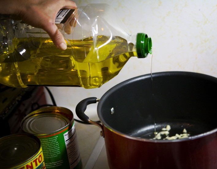 olive oil poured into a pot