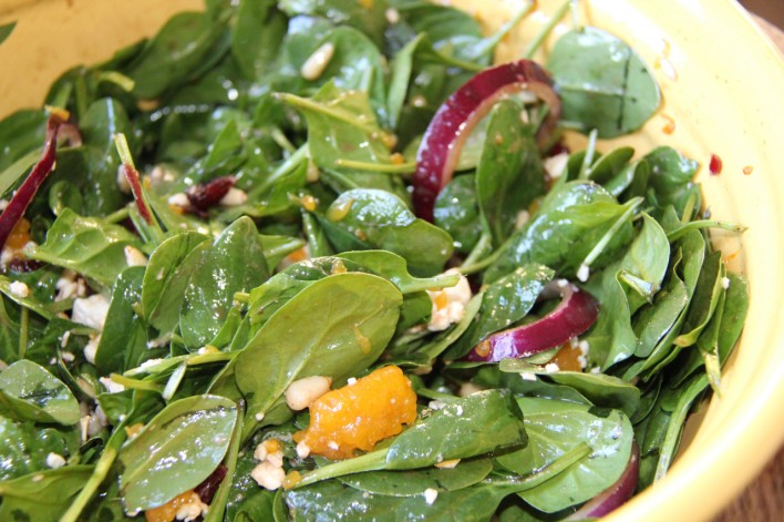 spinach, mandarin orange salad close up