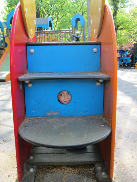 preschooler playing at playground in Jardin du Luxembourg