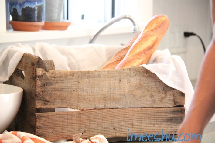bread loaves in an old wooden crate