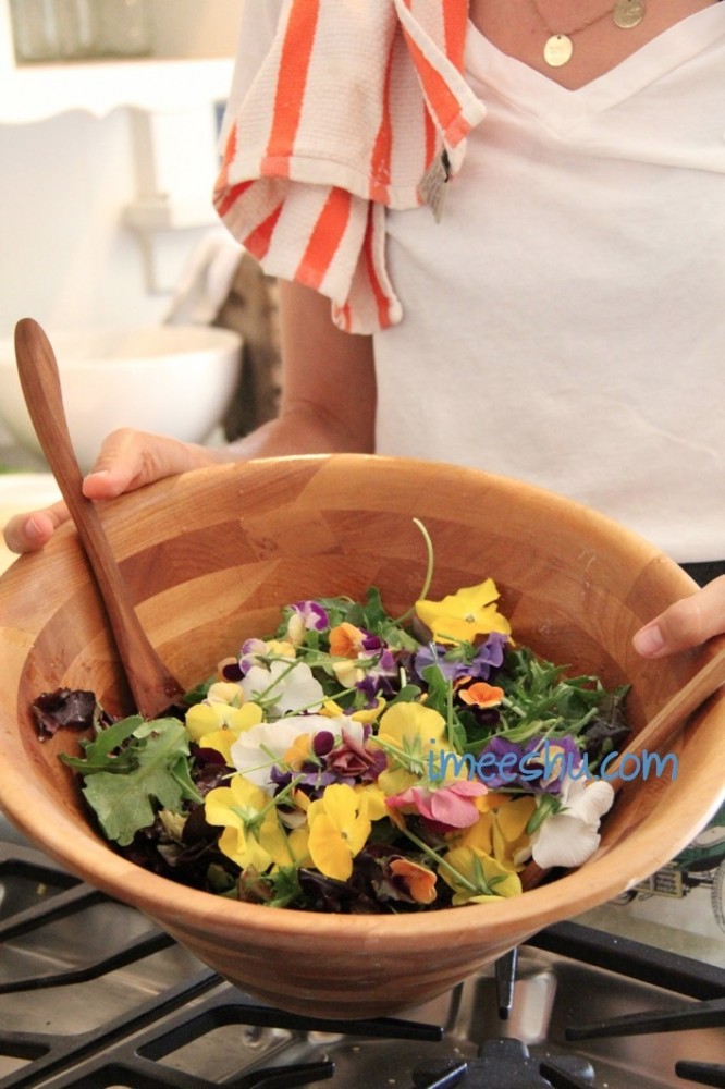 delicious salad with pansy flowers