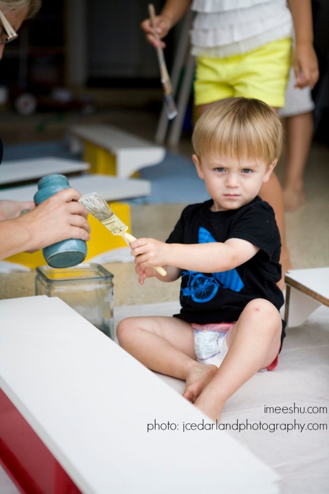 toddler painting with Miss Mustard Seed Milk Paint