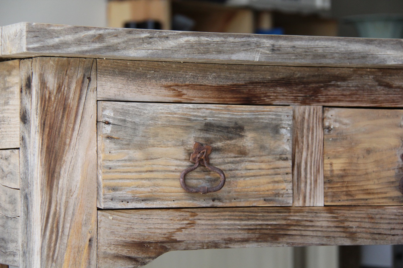 close up of mexican side table drawer front and hardware