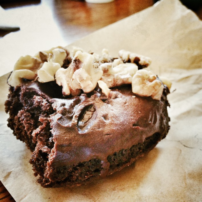 chocolate donut topped with walnuts from Sidecar Doughnut