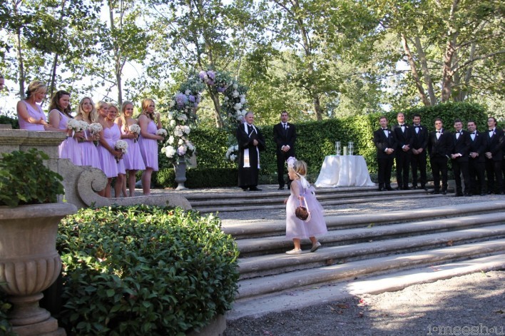 wedding party with flower girl at outdoor Napa romantic wedding