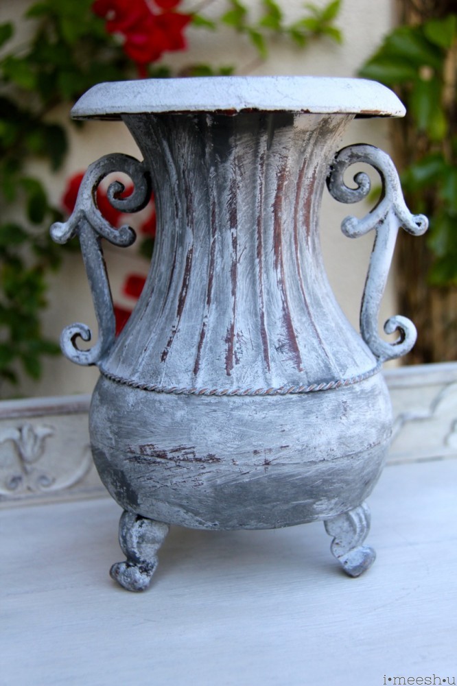 white washed metal urn
