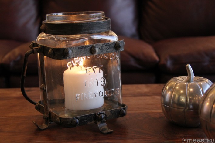 metal and glass hurricane jar with candles One Kings Lane