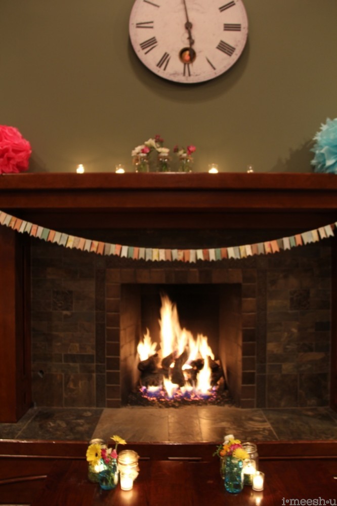 fireplace-with-pennant-banner-candles