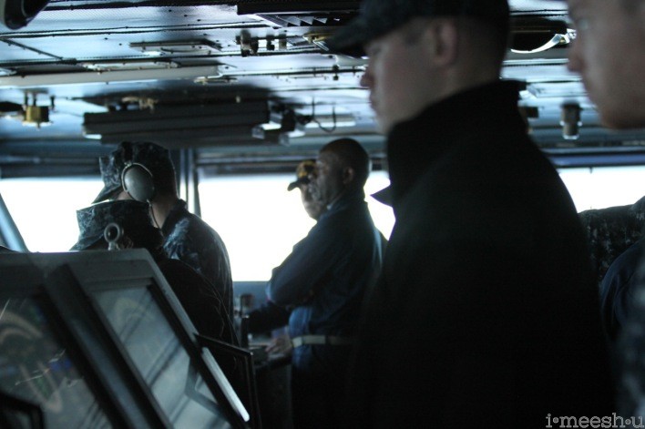navy-crewman-steering-aircraft-carrier